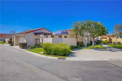 Glorious Mesa Verde Single Level home, beautifully remodeled throughout with sublime NEW features. Blessed with a prime end unit location on a quiet cul-de-sac in this desirable community nestled up to San Juan Hills Golf Club in iconic San Juan Capi...