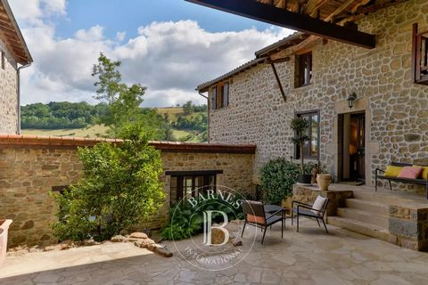SAINT-MARTIN-EN-HAUT. Very beautiful and charming stone house built in 1850, on 3 levels, renovated and decorated by an interior designer. The porch of this property leads to a vast courtyard of about 150 sqm, partly covered, which gives access to th...
