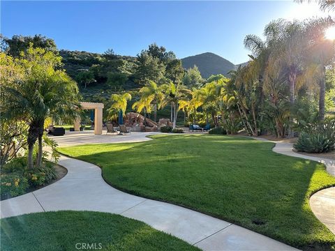 A Gorgeous Golf Course view with 0.44 acres huge flat Lot Size, the real land of kings on market now. The backyard is done with Rock Pool & Spa, waterfalls. Fireplace, basketball court and Huge Covered Patio. Granite counters in the kitchen and new p...