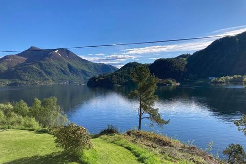 Spacious holiday apartment by the fish-rich Våglandsfjord. Final cleaning is included in the rental price. The holiday apartment is one of the two apartments that are in the house. This apartment is located on the main floor, and has a separate kitch...