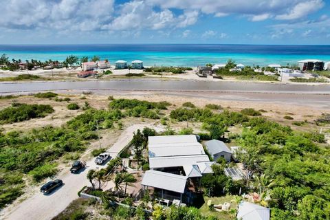 This stunning, solid and richly appointed 3 bedroom / 4 bath villa is nestled in a quiet, residential pocket on Grand Turk's west coast. The master wing includes a sitting room with fireplace, sunken, Jacuzzi tub, etched glass shower, walk-in closet ...