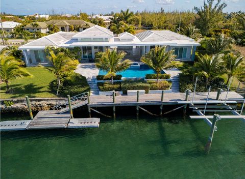 Nestled along the picturesque canals of Freeport/Lucaya in Grand Bahama Island, this exquisite 4 bedroom, 3 bath home epitomizes waterfront luxury living. Boasting an expansive 4500 square feet of living space, every inch of this residence is designe...