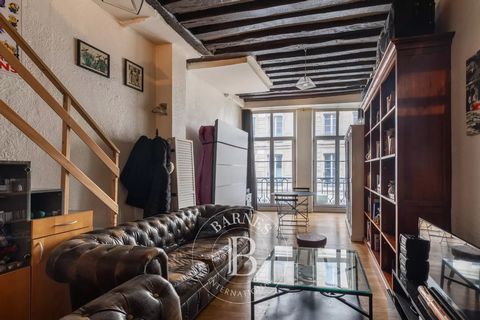Very quiet apartment on the second floor of a Paris stone building. Its loft-style layout features a hall with plenty of storage, a fully equipped kitchen, a bright living room, an additional sleeping area on the mezzanine, a shower room and a separa...