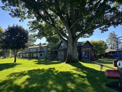 Welcome to South Shore Resort, a premier destination in picturesque Twin Lake, Michigan. Nestled along the tranquil shores of one of Michigan's most stunning lakes, the resort offers the perfect blend of rustic charm and modern comfort. This all spor...
