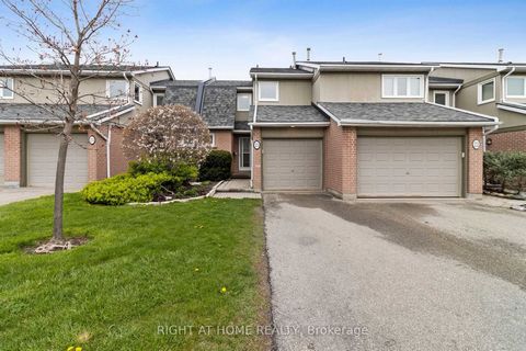 Newly listed 2 storey Condo townhouse with built in garage! Well maintained and recently RENOVATED. Large windows flood the main floor with natural light. The kitchen is a culinary delight; open concept with natural gas stove, built-in wine cabinet a...