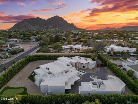 Welcome to your dream home nestled in the heart of Paradise Valley. Presenting this exquisite newly constructed luxury residence that epitomizes modern elegance and sophistication, set on over an acre of private, gated land. As you step into this 6,1...