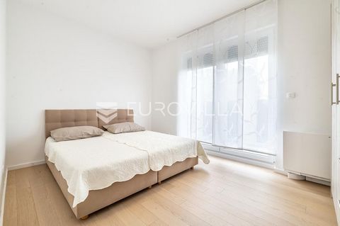 Zagreb, Donja Dubrava, Ulica kneza Branimira, two-room apartment NKP 60.91 m2 in a newly built residential building. The apartment has a closed area of 53.32 m2 with a balcony of 2.61 m2 and a parking space in the garage of 13.88 m2. It consists of a...