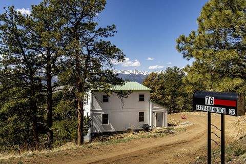 Escape to your own private mountain retreat with this stunning 3 story home offering breathtaking views of the Sangre de Cristo mountain range. The 1.36 acres of heavily wooded land provides a sense of seclusion and tranquility, perfect for those who...