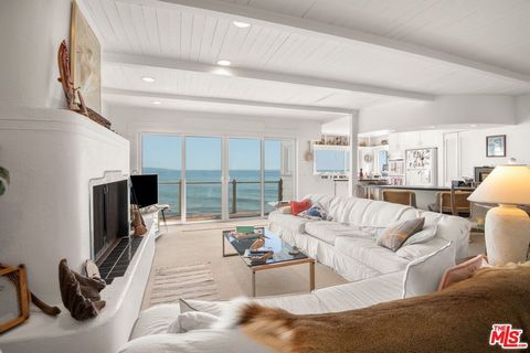 AUCTION: All offers due by June 21. Bidding will be completed by June 28 to the highest bidder subject to owners terms. A Lowest Price and Best Value Malibu Beach House On Market ! Tremendous opportunity to own a 3 story beach house on Las Tunas beac...