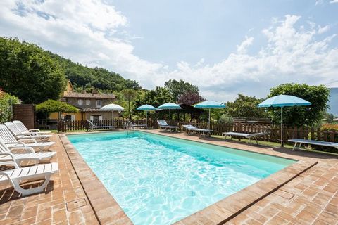 Located in Assisi, this 2-bedroom holiday home hosts 6 people comfortably. It is perfect for a group or families with children to enjoy a shared swimming pool and table football. Here you can enjoy a vacation in the tranquil nature with a forest at 2...