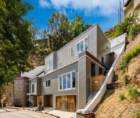 New development opportunity in Hollywood Hills. This property is a 3,300-square-foot, 3-bedroom, 3.5-bathroom single-family home, with a 3-car garage and 1,000-square-foot rooftop deck. The development plan consists of new construction to build a con...