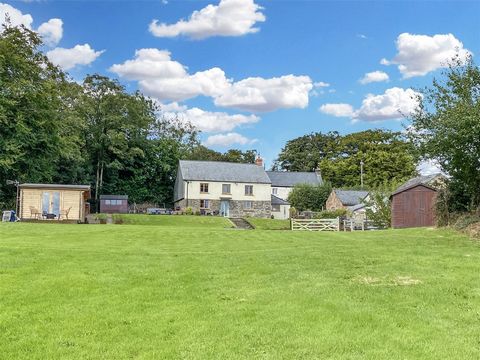 Enjoying a south facing position and commanding far reaching views over its own land amounting to 1.88 acres, this attractive farmhouse is set right at the end of a 1/3 of a mile wel maintained track, with just two other neighbouring barns. Beamed ce...