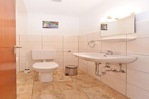 Set in the heart of the Allgäu countryside, this inviting 2-bedroom holiday home offers a fun-filled escape for up to 6 guests. Families and groups can enjoy a shared swimming pool, table tennis, billiards, and a tennis court, while evenings are perf...