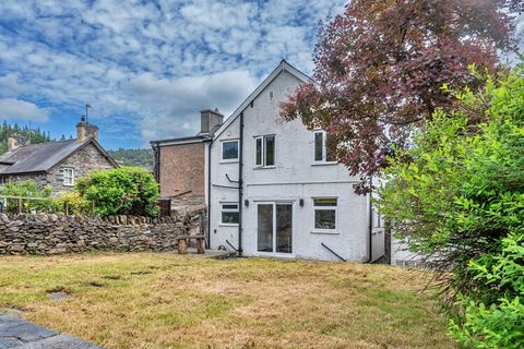 This traditional stone-fronted cottage, dating back to the 1860s, accommodates up to five guests. It features three charmingly furnished bedrooms, including two double beds and one single. The living area is bright and inviting, offering a large corn...