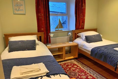This charming second-floor apartment offers breathtaking views over the Menai Strait and Snowdonia mountain range, providing the perfect base for families or small groups. The accommodation includes three well-appointed bedrooms: a zip/link king-size...