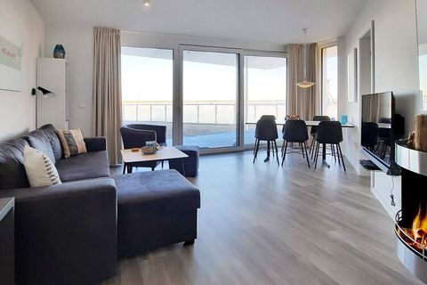 Appartamento moderno e confortevole con vista sul Mar Baltico e sul porto turistico. Goditi la splendida vista panoramica sul Mar Baltico dalla mattina alla sera. L'appartamento moderno e arredato in modo confortevole è composto da una cucina-soggior...