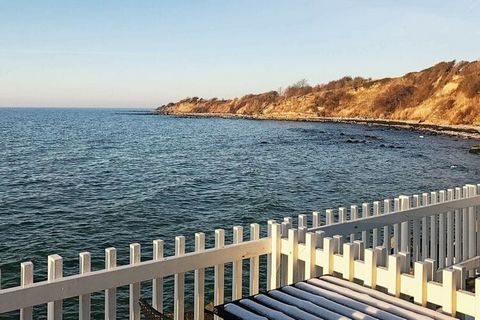 A unique, wooden holiday cottage with whirlpool and panoramiv views located on the northern pier of the marina of Hasle. From the cottage you have a panoramic view over the Baltic Sea, the marina and the fantastic rocky coast. The house was renovated...