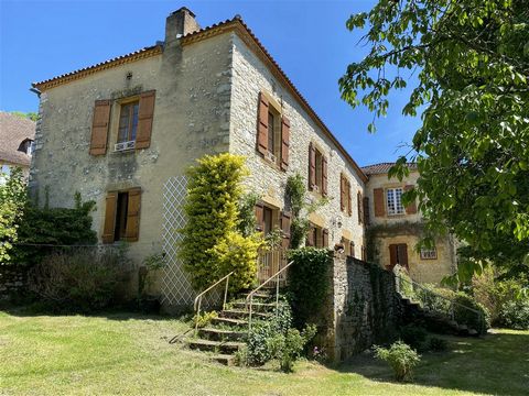 In a 'bastide' village with shops and services, a school and medical centre.. Ground Floor: Entrance Hall (21.6 m2) with terracotta tiled floor, staircase, door to terrace; Kitchen/dining room (21.9 m2) with fitted wall and floor units, door to terra...