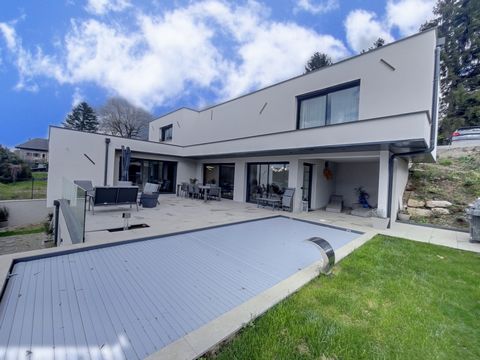 EXCLUSIVITY, Aix les bains SUD, in the town VIVIERS-DU LAC, Superb new villa of 218 m2 organized in inverted triplex, it includes on the ground floor: double garage, entrance hall, separate toilet, and master suite. Below, on one level on a large ter...