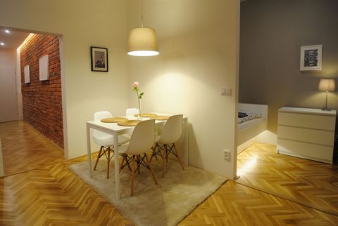 The apartment is located just next to the historical gate to the old town. 100 meters away from the place you will find the famous Saint Wenceslas Cathedral which cornerstone was laid in 1104 AC. Modern minimalist interior design of the apartment is ...