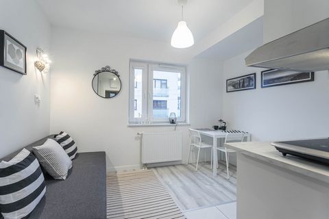 Studio apartment in a recently built building at ul. Koprzywiańska 5 (right next to the tram terminus at ul. Grochowska, Praga Południe, Gocław) . May be for 1 person or for a couple (there is one foldable sofa bed). Only 100 meters to the tram termi...