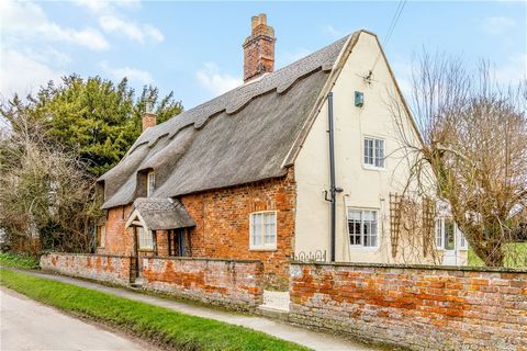 In a very peaceful position just outside Horncastle, a Grade II listed, chocolate box pretty, thatched cottage full of character inside and out, has recently been sympathetically and tastefully renovated to provide a light and spacious home. Two bedr...