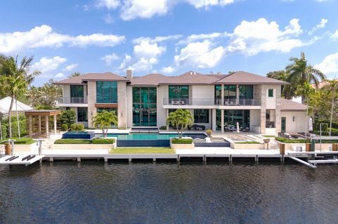 Discover this exclusive luxury waterfront estate in Bay Colony, Ft Lauderdale, designed by renowned Stofft Architects. Nestled within a gated, yachting, and 24/7 armed security community, it offers privacy and peace of mind, mins. from PineCrest Scho...