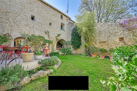 Ideally located, between Nimes and Montpellier in the heart of the charming village of Aigues-Vives, hides this astonishing village house of approximately 245 m2 including an independent outbuilding of 55 m2. The entrance to the property via a beauti...