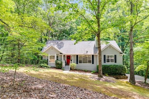 Welcome to this charming 3-bedroom, 2-bathroom home sits nestled on picturesque private wooded lot, offering serenity and seclusion. It's located in the highly sought after Chapel Hill area. As you step inside, you're greeted by a cozy family room wi...