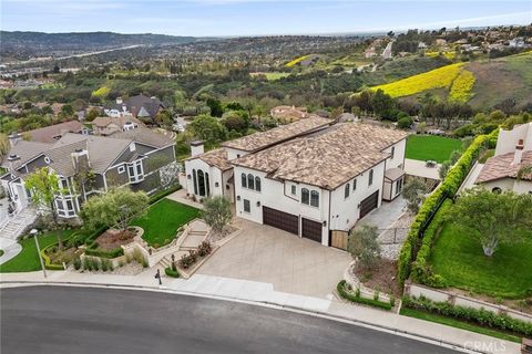 Mission Mariposa is one of the most extraordinary view estate homes to come to market in Yorba Linda! Situated in exclusive Hidden Hills amongst North County’s most expensive builds, this property was developed for the matchless panoramic views and c...