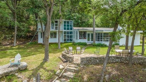 Escape to your own private oasis with this amazing water front property that sits on the Perdernales River and opens up to Lake Travis. Situated on a tranquil, 2.95 acre west facing lot that offers breathtaking sunset views. It's an incredible opport...