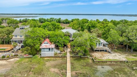 Welcome to 2713 Buccaneer Rd. A secluded paradise off the coast of Charleston, SC. This custom elevated 4 bedroom, 4 bath house is located on the secluded Goat Island, surrounded by a breathtaking waterway and ocean views of Isle of Palms, Charleston...