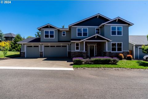 Nestled in West Meadows, this stunning custom home offers an open layout, spacious kitchen w/ gorgeous cabinets and slab counters, views of a serene stream from windows and a covered patio, 4 bedrooms w/ ample closets, plus den/5th bedroom downstairs...