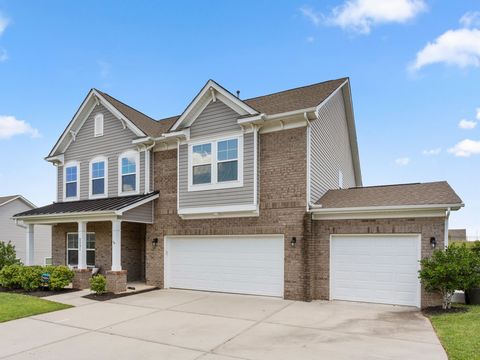 Welcome to this beautiful 5 bedroom, 4 bathroom, 3-car garage, 2-story home in the sought-after community of The Mills at Rocky River! This functional open floor plan features a spacious living/dining area upon entering the home, with an updated kitc...