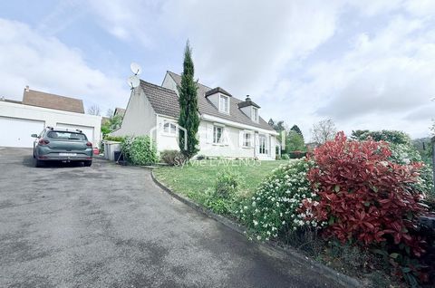 A PASLY 02, JOLIE MAISON 7P. AVEC 5 CHAMBRES, VERANDA, 2 GARAGES, PISCINE, SUR SON TERRAIN CLOS DE 2499 M2.