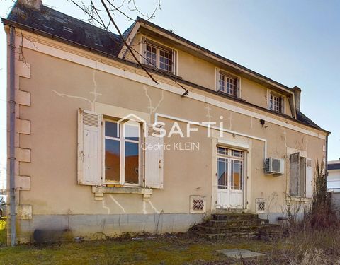 Maison avec potentiel et grand terrain