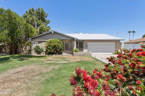 This charming 3-bedroom, 2-bathroom home is nestled in a serene, no-HOA neighborhood. Enjoy the beauty of lush shade trees and vibrant bushes both front and back. Recent updates include a new water heater, fresh paint throughout, new fixtures, faucet...