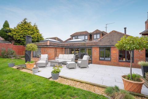 Nestled in a stunning area of outstanding natural beauty, this superb property has been meticulously renovated to offer expansive open plan living spaces, separate living room with log burning stove and four spacious double bedrooms, and two modern b...