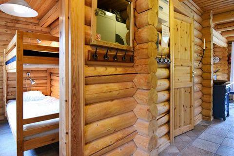 This spacious holiday home, located by the stream Saldalsbäcken, by the fell Hundfjället, is perfect for nature lovers who want to stay in a peaceful environment. The interior of the log cabin is light and airy, and tastefully decorated. There are th...