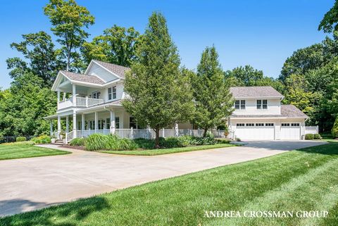 Lake Michigan's finest! A nearly new expansive beach home on low bluff backing up to a creek and 70+ acre arboretum with trails & bridges. Great views of Lake Michigan. Low bluff beach with sandy, walkable beach located between South Haven and Saugat...