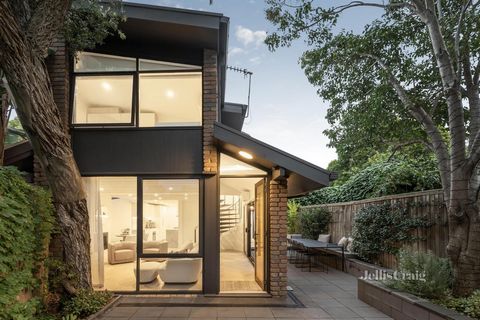 Extensively renovated, this stunning Graeme Gunn designed dual level residence emerges as a beacon of style, sophistication, and tranquillity, quietly tucked away yet central to Fawkner Park, Toorak Rd’s fine dining, and the Chapel St precinct. Baski...