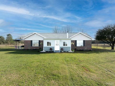 COUNTRY LIVIN' AT ITS FINEST!!! This gorgeous home sits on 1.5 acres surrounded by farm land and nature. The wide open space gives the perfect setting to see breathtaking sunrises AND sunsets, and you will love the soothing sounds of the breeze, the ...