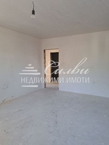 Two-bedroom brick apartment NEW BUILDING with yard Dobrudjanski. Distribution: kitchen with living room, two bedrooms, corridor, two bathrooms with toilet. The apartment is offered in the degree of completion according to BDS. The building is disting...