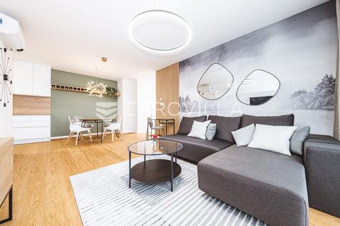 Modern two-room apartment on the sixth floor of a new building with an elevator, NKP 96.15 m2. It consists of an entrance hall, a bathroom, an open space living room with access to a balcony, a dining room and a kitchen, and two bedrooms with a total...
