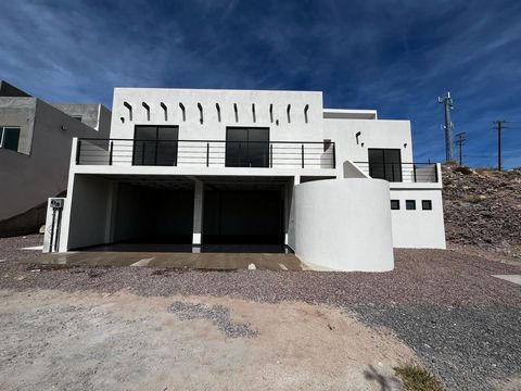 Situated on a tranquil street this newly constructed home in La Paz Baja California Sur Mexico is the ideal residence for a family. Boasting four bedrooms it features a spacious and open concept layout seamlessly integrating the living dining and kit...