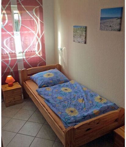 cozy apartment, only a few minutes to the natural beach with 2 bedrooms, up to 4 people
