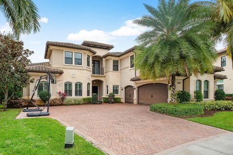 ALMOST HALF ACRE LOT at the end of a CUL-DE-SAC on a LAKE with STUNNING VIEWS. BEST LOT in the BRIDGES!! Collanade Grande model at Bridges community in Delray Beach. Impressive residence is move-in ready, with over 5,500 sqft, 6 bedrooms, 5 bathrooms...