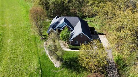 Discover the serenity of country living in this lovely brick ranch nestled on a private 2.34-acre wooded lot in Sauk Point Estates in the town of Middleton. This 4,000+ sq ft home offers breathtaking views and unmatched privacy. Features include an o...