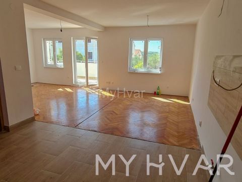 This attractive two-story apartment, located near the center of the town of Hvar, offers 95 m² of interior living space. The first floor features a living room, kitchen, and bathroom, while the second floor includes three bedrooms and an additional b...
