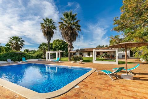 This seven bedroom farmhouse for sale in Silves is situated in a land of 59,040m2 surrounded by nature and amazing views. Built in 1994 and sold semi-furnished, the single storey main house is composed of 7 bedrooms with en-suite bathrooms and walk-i...
